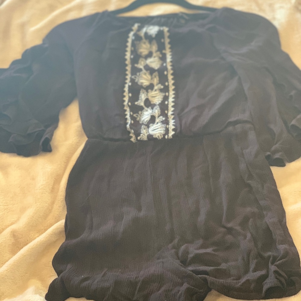 Black romper with white flowers